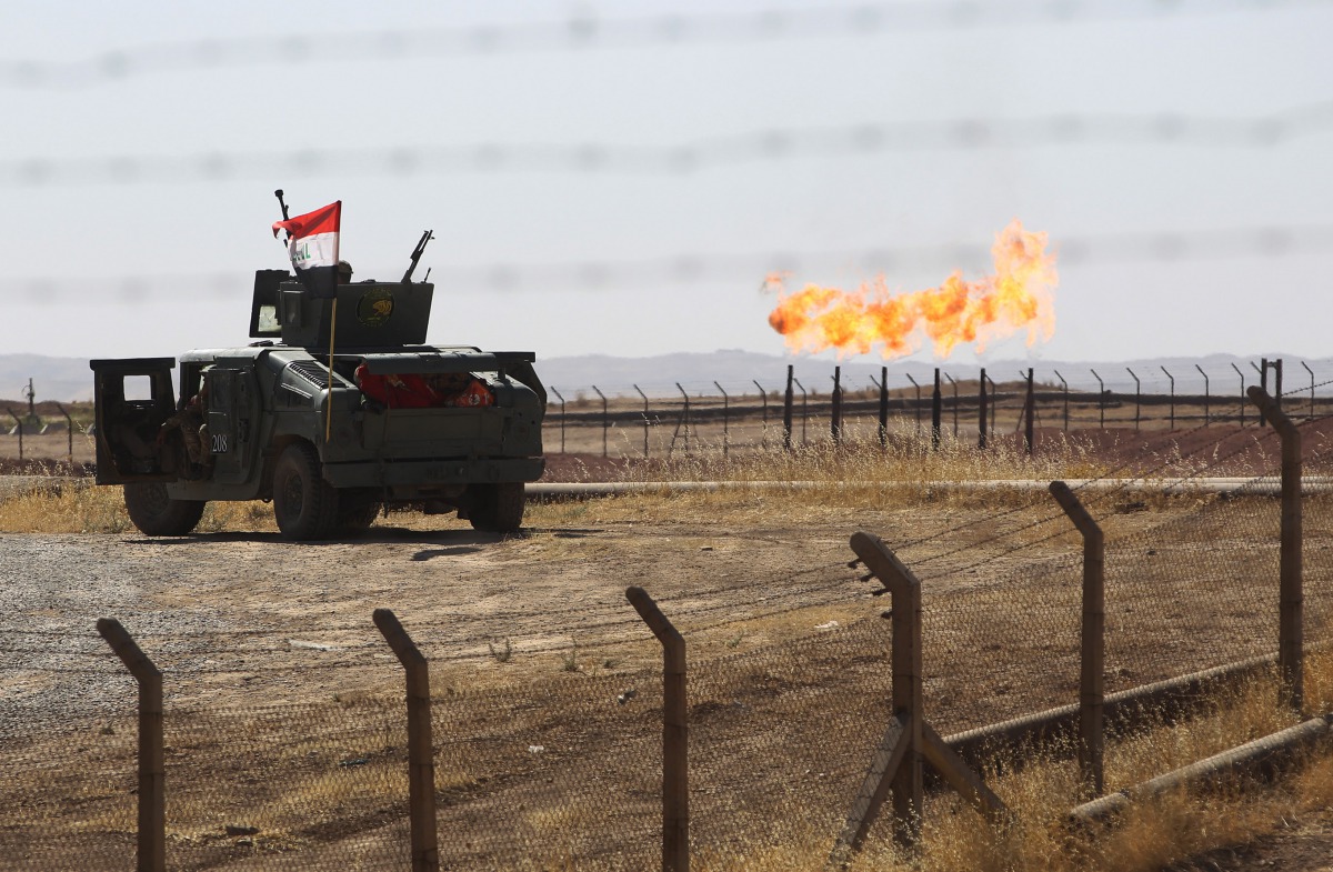 A picture shows an Iraqi army vehicle at the country's Bai Hassan oil field west of Kirkuk on October 17, 2017. Iraqi forces took control of the two largest oil fields in the disputed northern province of Kirkuk demolishing Kurdish hopes of creating a via
