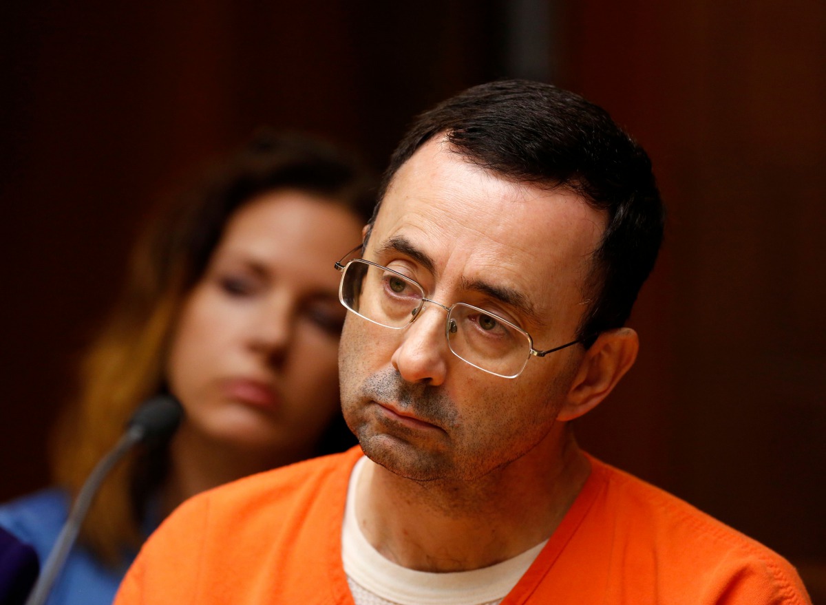This file photo taken on June 23, 2017 shows former Michigan State University and USA Gymnastics doctor Larry Nassar seen in the 55th District Court where Judge Donald Allen Jr. bound him over in Mason, Michigan, to stand trial on 12 counts of first-degre