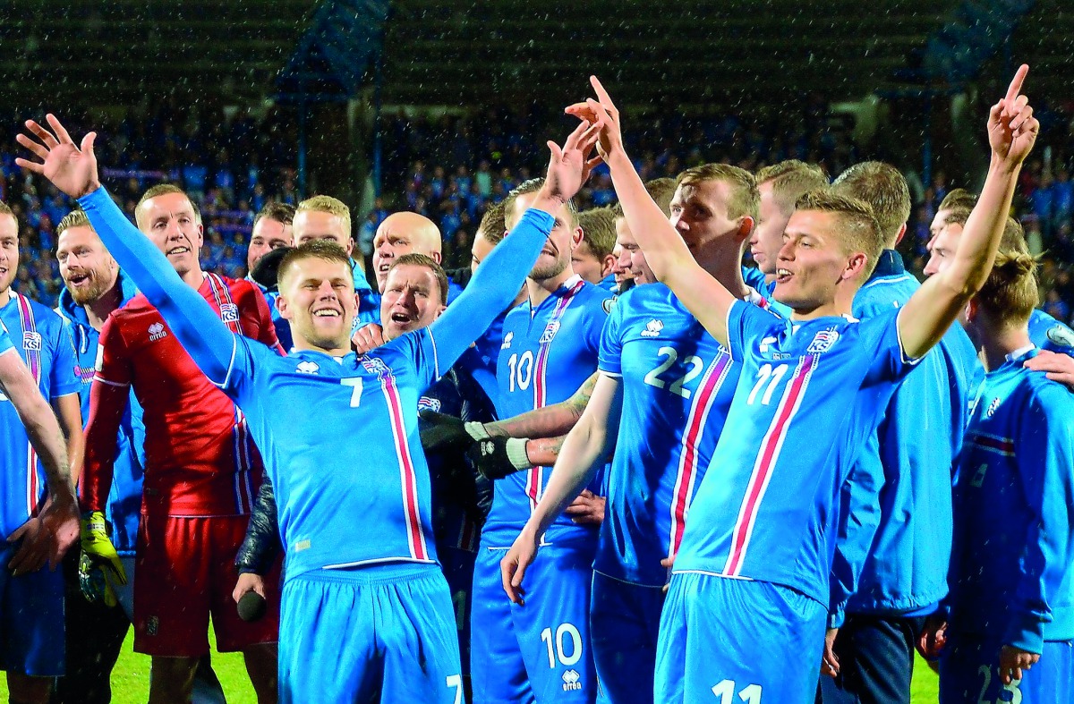 Iceland’s players Johann Berg Gudmundsson (left) and Alfred Finnbogason celebrate after the FIFA World Cup 2018 qualification match against Kosovo in Reykjavik, Iceland in this October 9 file picture.