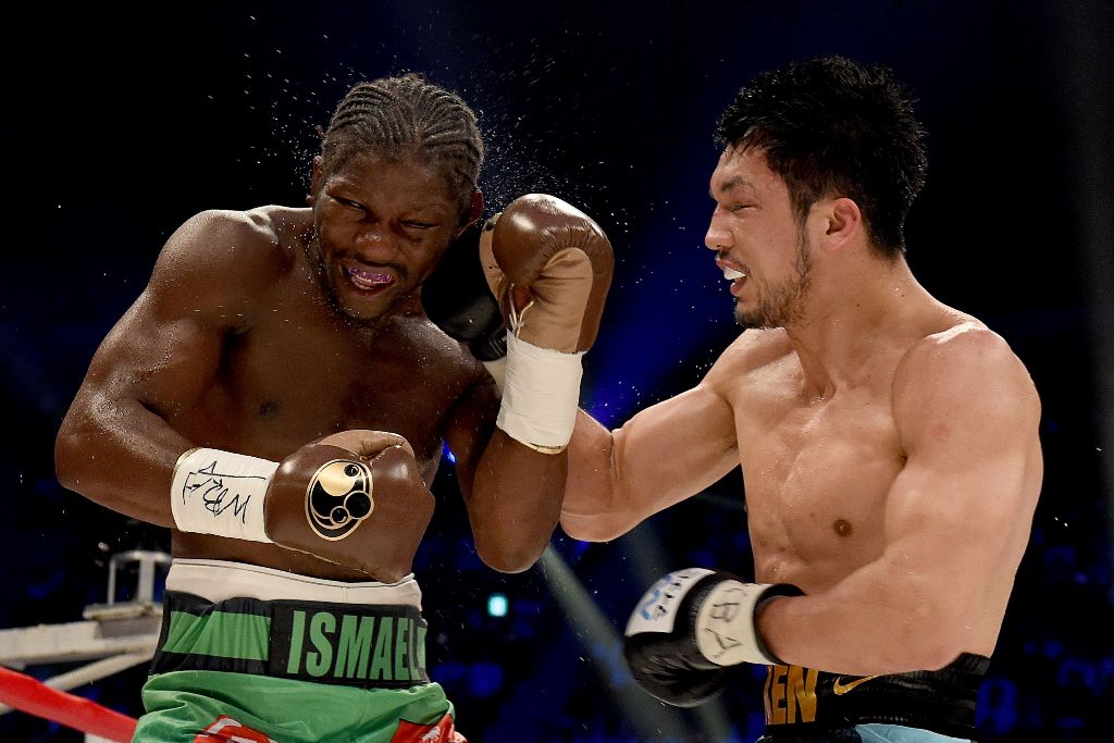 (FILES) This file photo taken on May 20, 2017 shows Hassan N'Dam of France (L) and Ryota Murata of Japan exchanging blows during the 10th round of the WBA middleweight title bout in Tokyo. AFP / Toru YAMANAKA
