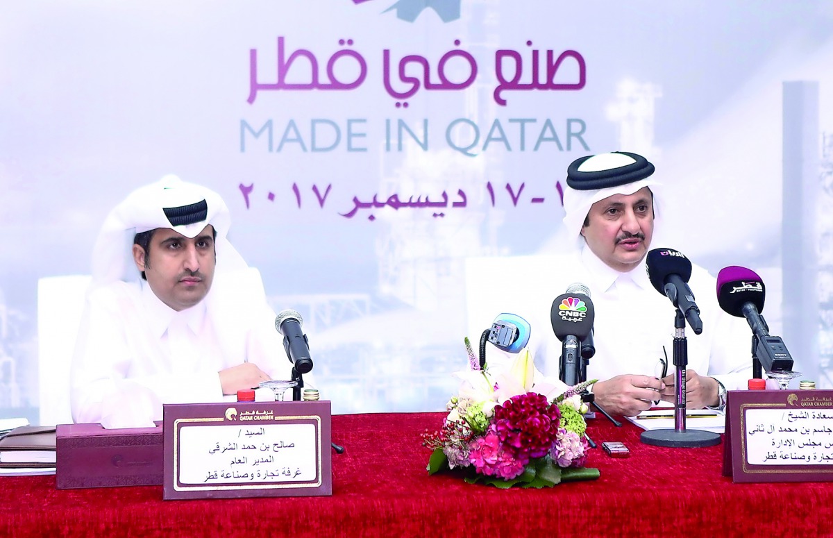 Sheikh Khalifa bin Jassim Al Thani (right),  Chairman of Qatar Chamber (QC) at a press conference held at QC headquarters yesterday, announcing the details of ‘Made in Qatar’ expo. Also seen is the Director-General of QC, Saleh bin Hamad Al Sharqi.