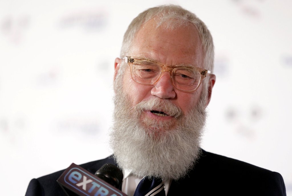 Comedian David Letterman speaks to the media as he arrives for a gala where he is receiving the Mark Twain Prize for American Humor at Kennedy Center in Washington, U.S., October 22, 2017. REUTERS/Joshua Roberts