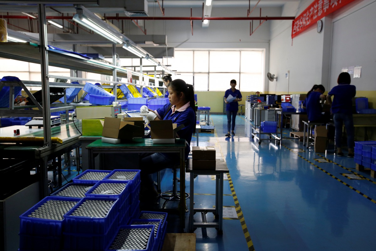 Batteries for electric vehicles are manufactured at a factory in Dongguan, China September 20, 2017. Picture taken September 20, 2017. Reuters/Bobby Yip