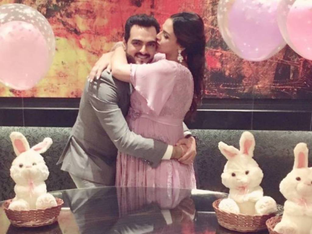 A picture of the couple on their baby shower shared by Esha Deol on her instagram