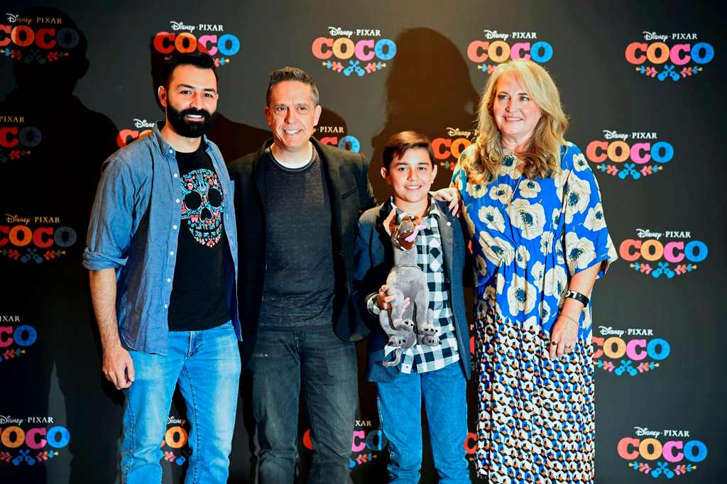 (L to R) Mexican-American Co-director Adrian Molina, US Director Lee Unkrich, Mexican singer and actor Luis Angel Gomez and US Producer Darla K. Anderson pose for the media during a press conference on 