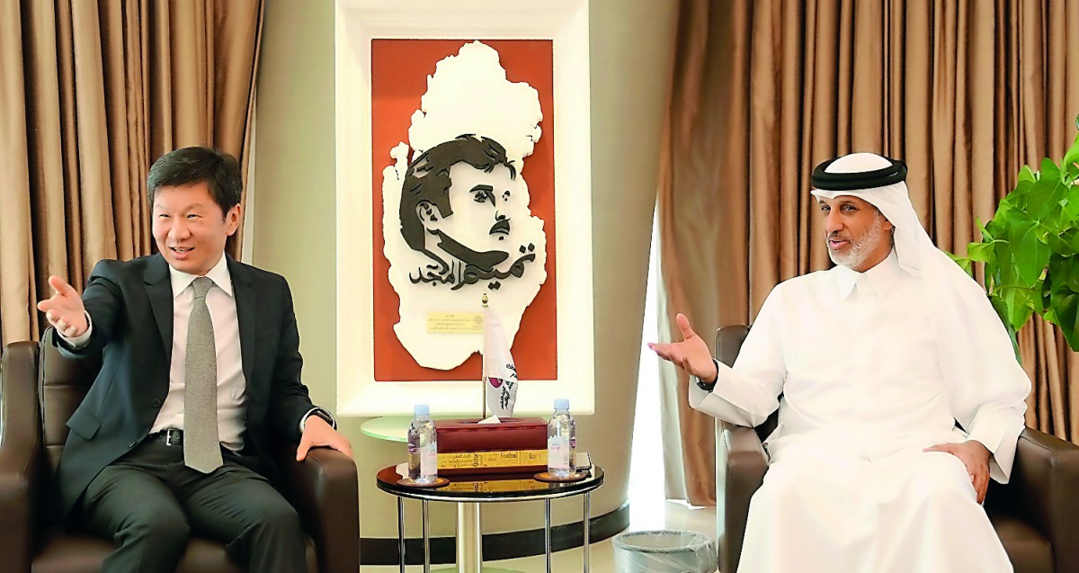 Sheikh Hamad bin Khalifa bin Ahmed Al Thani, President of the QFA and Chung Monggyu, President of the KFA during the cooperation agreement signing ceremony at Al Bidda Tower yesterday. 
