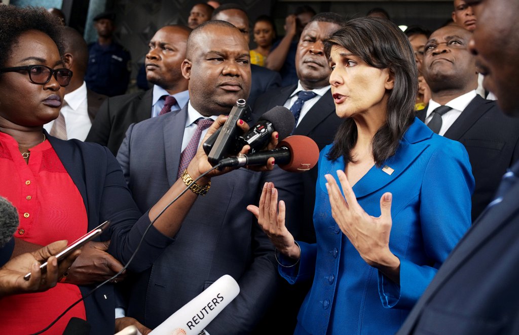 US Ambassador to the United Nations Nikki Haley and President of Congo's electoral commission (CENI) Corneille Nangaa (C) addresses the media at the CENI headquarters in Gombe, Kinshasa, Democratic Republic of Congo, October 27, 2017. REUTERS/Robert Carru