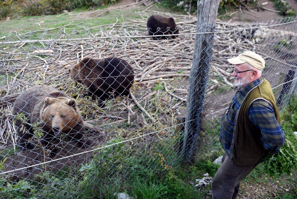This photograph taken on October 16, 2017, Ivan Crnkovic-Pavenka gestures as he speaks at his shelter for brown bears in the village of Kuterevo.  AFP / STR