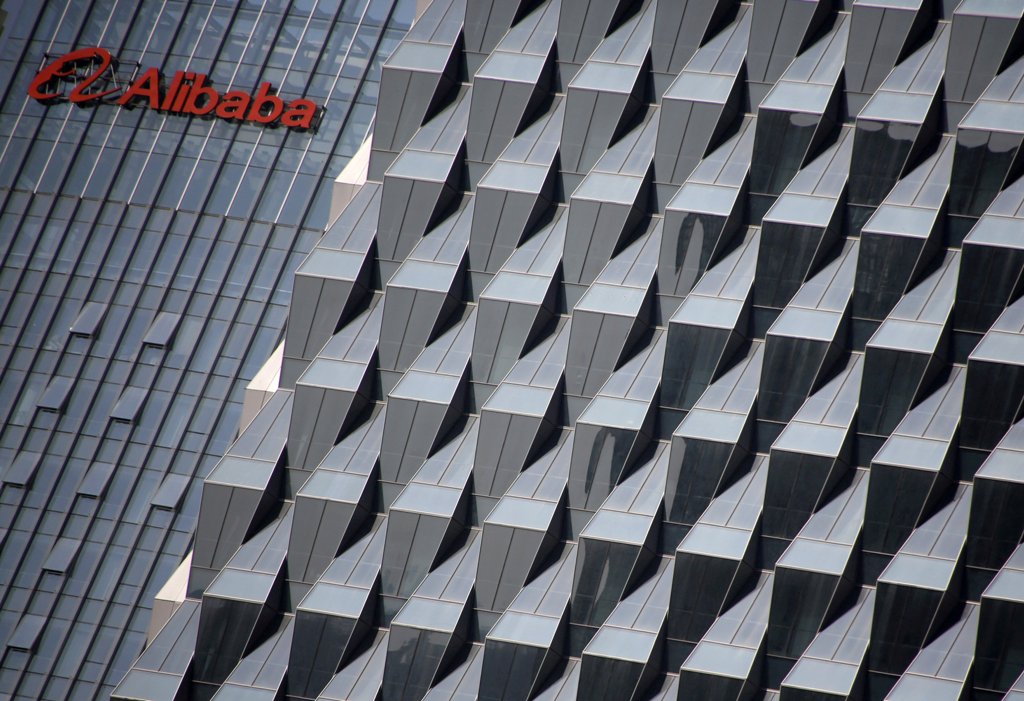 FILE PHOTO: A logo of Alibaba Group is seen on a building under construction, where the company's Beijing headquarters will be, in Beijing, China, October 15, 2015. REUTERS/Kim Kyung-Hoon/File Photo 
