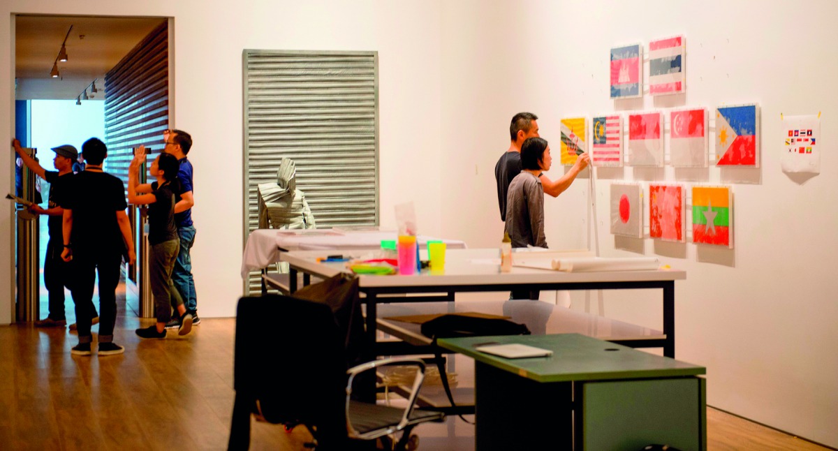 This photograph taken on November 1, 2017 shows people setting up artwork at the Museum of Modern and Contemporary Art in Nusantara (Museum MACAN) in Jakarta. AFP / Bay Ismoyo