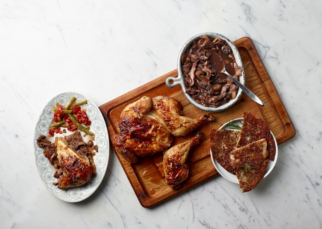 Greek-Style Roast Chicken With Crispy Rosemary Potato Pancake and Sauteed Mushrooms (Photo for The Washington Post by Renee Comet)
