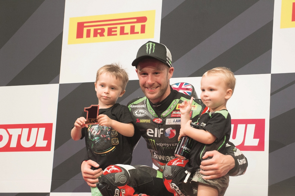 British WorldSBK World champion Jonathan Rea poses for photographs with his sons Jake and Tyler after winning the second successive race at the floodlit-Losail International Circuit (LIC) yesterday. 