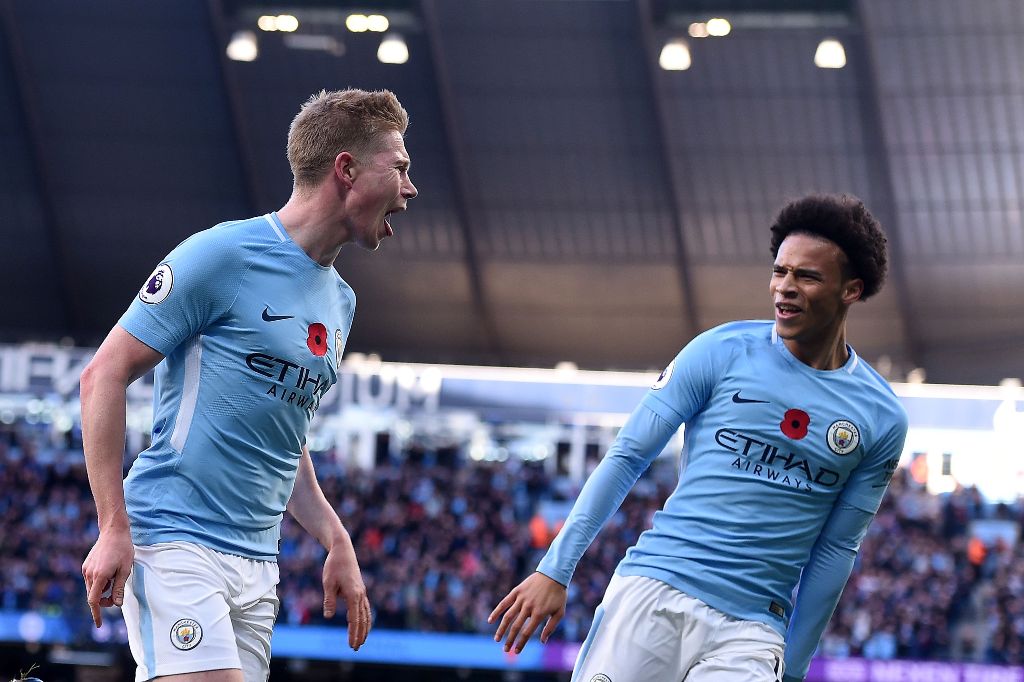 Manchester City's Belgian midfielder Kevin De Bruyne celebrates scoring the opening goal during the English Premier League football match between Manchester City and Arsenal at the Etihad Stadium in Manchester, north west England, on November 5, 2017.  AF