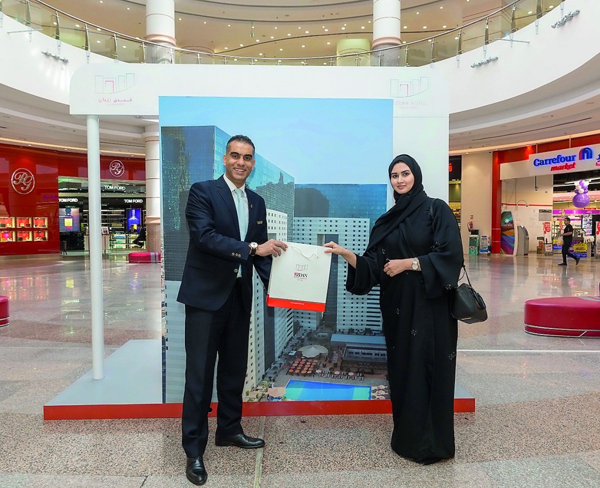Wael El Telbany (left), Acting General Manager, Ezdan Hotels, during the campaign.