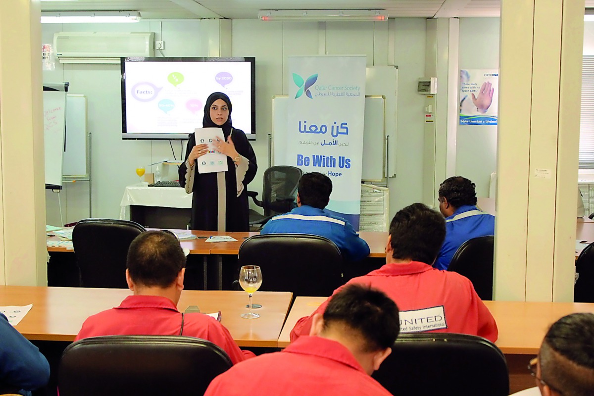 Participants pay attention an expert at the campaign organised by Qatar Cancer Society to raise awareness about prostate cancer. 