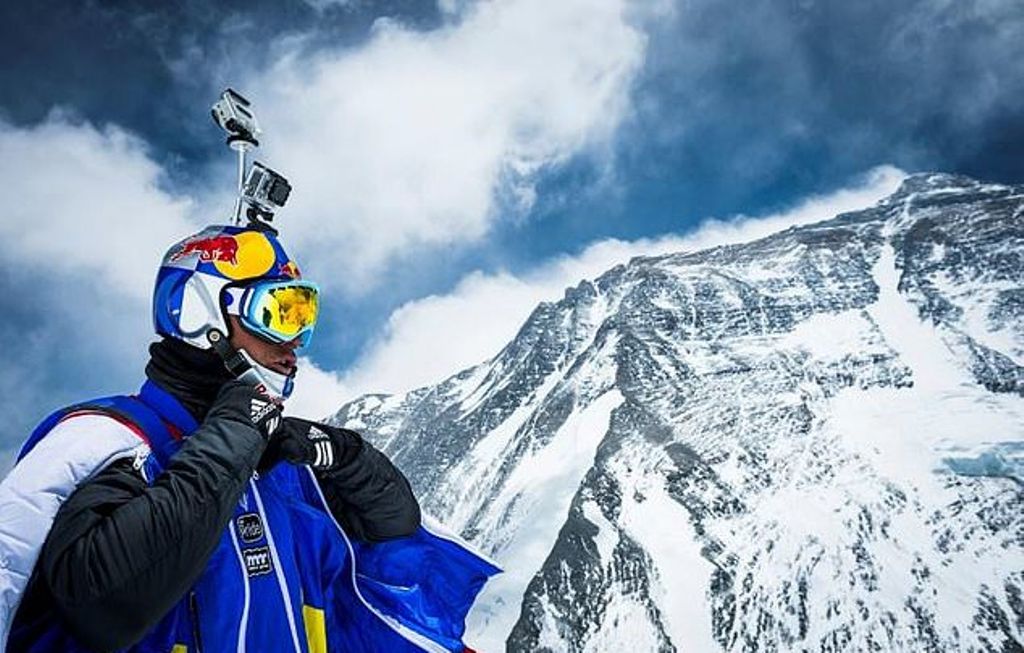Russian base jumper Valery Rozov is pictured preparing to jump off the north face of Mount Everest into Tibet in China on May 5, 2013. / AFP.