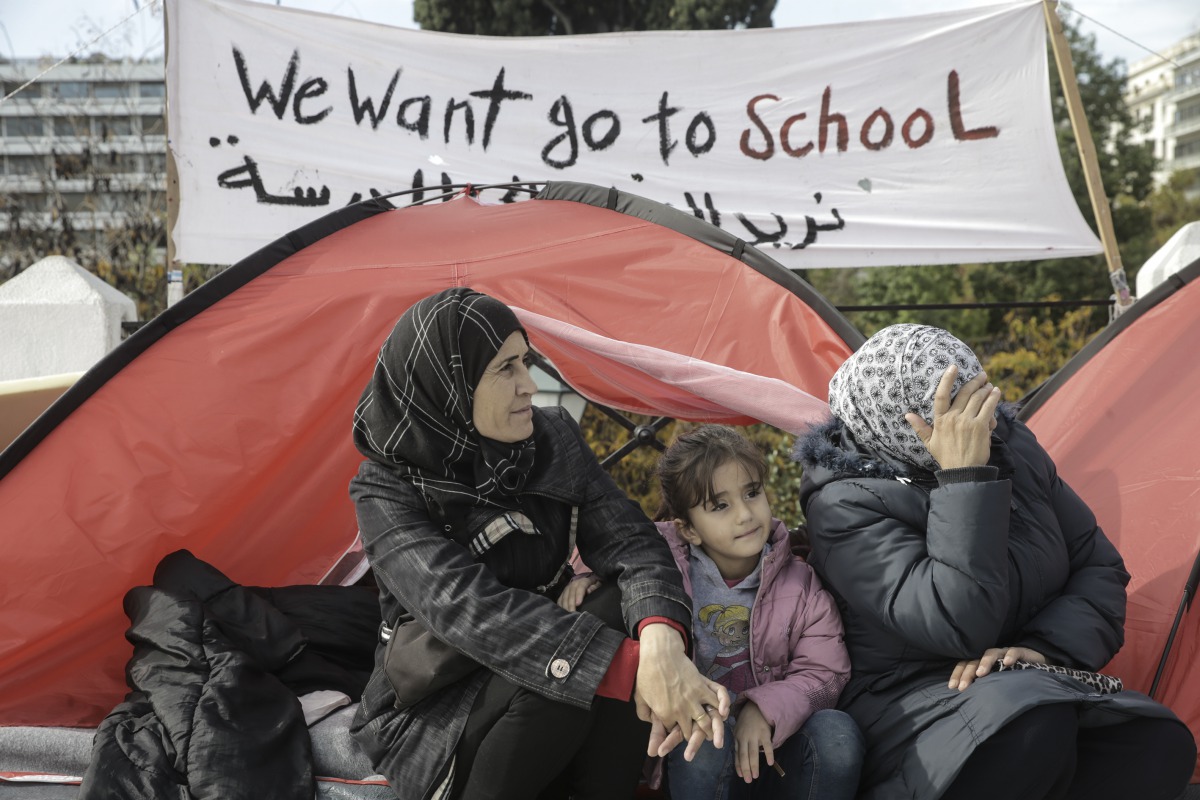 Refugees are seen as they hold a press conference following ending their hunger strike held to meet with their families in Europe on November 14, 2017 in Athens, Greece. (Ayhan Mehmet- Anadolu Agency)