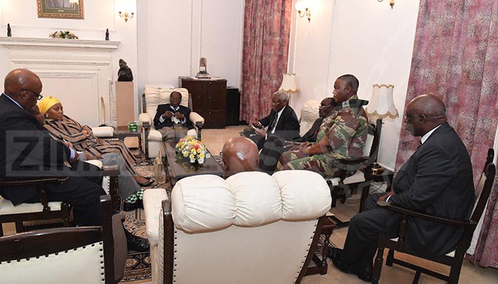 An image published in The Herald (@HeraldZimbabwe) website in which Mugabe meets ZDF Commander General Constantino Chiwenga, Father Fidelis Mukonori and South African envoys at State House this afternoon.