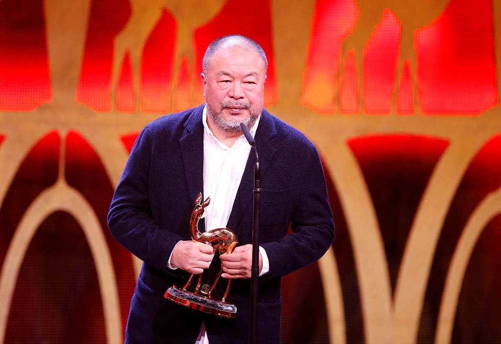 Artist Ai Weiwei receives the Bambi trophy during the Bambi 2017 Awards ceremony in Berlin, Germany November 16, 2017. REUTERS/Axel Schmidt
