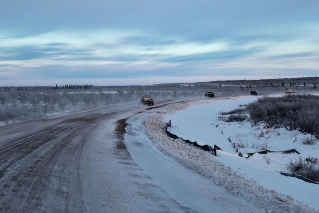 Cars are seen on the Inuvik Tuktoyaktuk highway on Nov 15, 2017 in Inuvik, Canada. PHOTO: AFP.