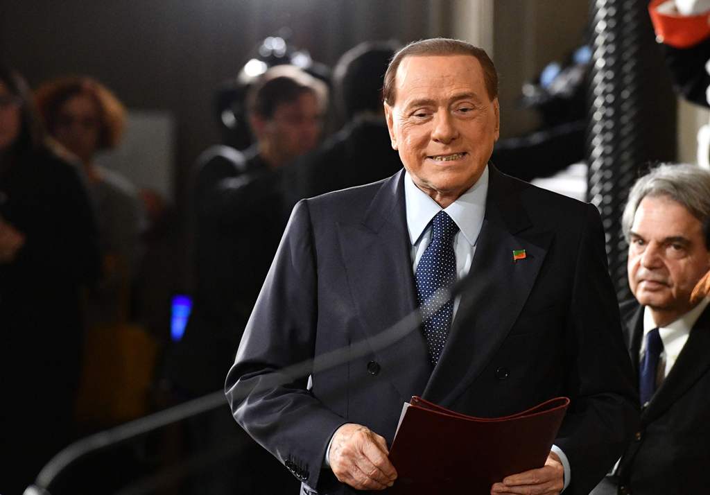 (FILES) This file photo taken on December 10, 2016 shows the leader of centre-right party Forza Italia - Il Popolo della Liberta, Silvio Berlusconi on December 10, 2016 at the Quirinale Palace in Rome. / AFP / VINCENZO PINTO
