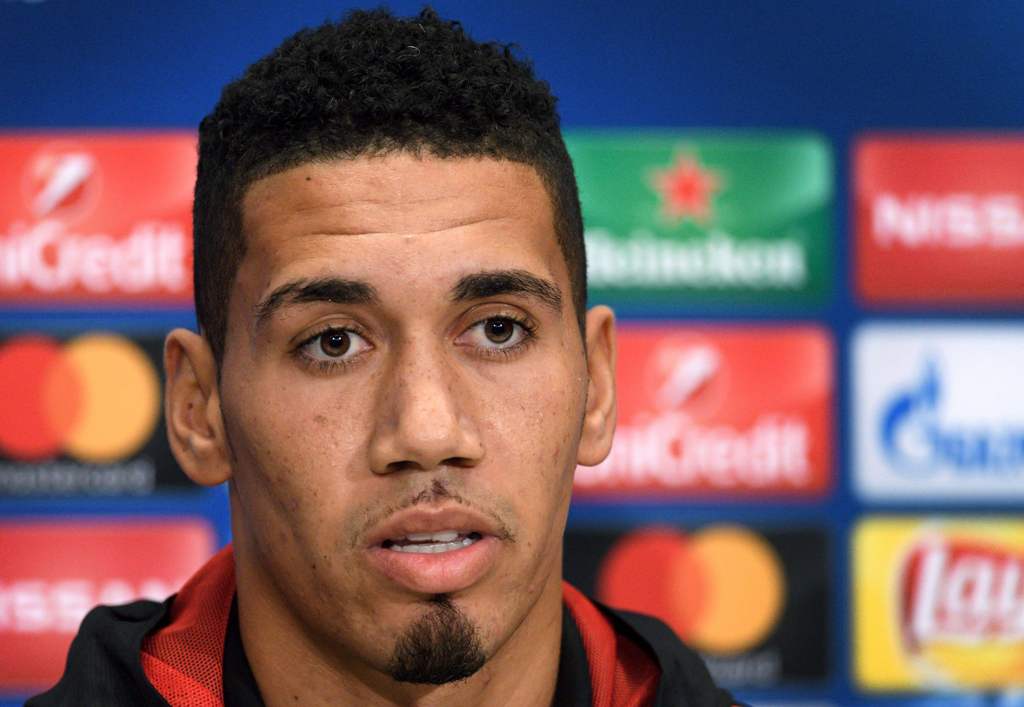Manchester United's English defender Chris Smalling attends a press conference on the eve of the UEFA Champions League Group A football match between FC Basel and Manchester United on November 21, 2017 in Basel.  AFP / Fabrice COFFRINI
