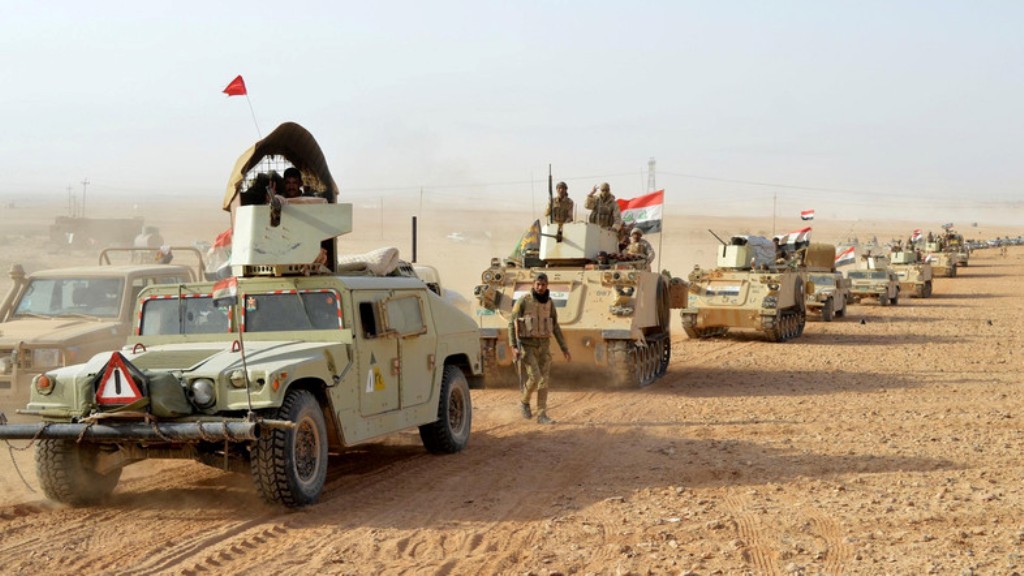 A file photo of Iraqi forces vehicles after they captured Rawa, the last remaining town under ISIS control. Reuters.