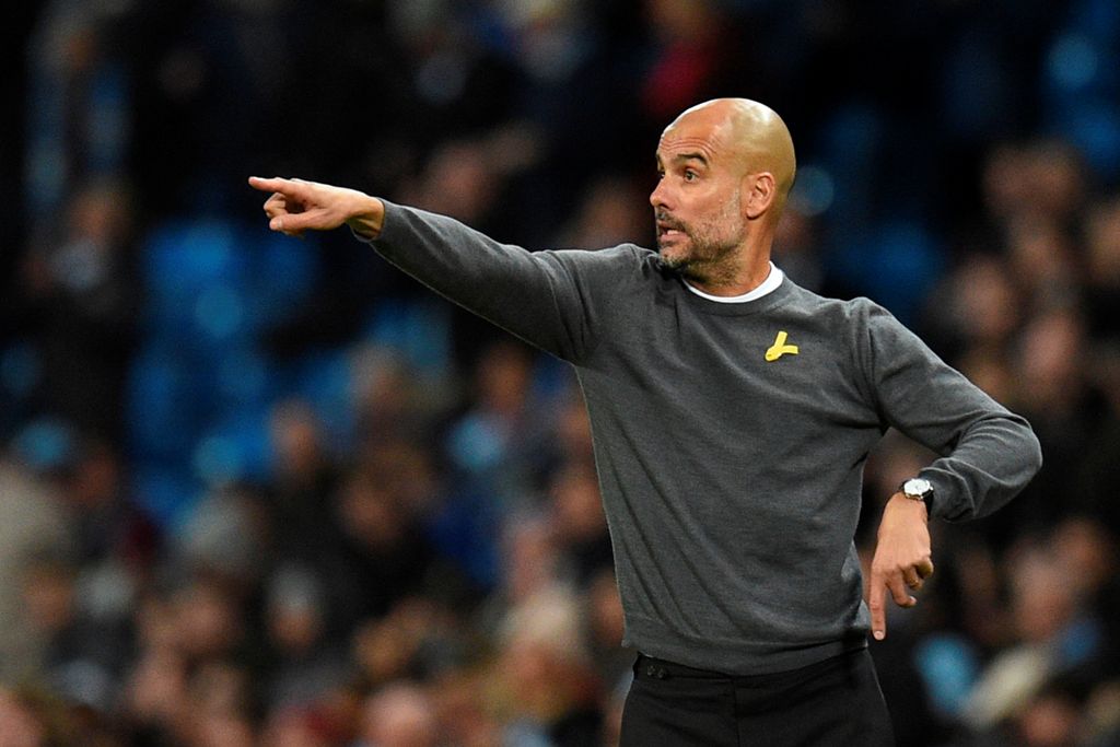 Manchester City's Spanish manager Pep Guardiola reacts on the touchline during the UEFA Champions League Group F football match between Manchester City and Feyenoord at the Etihad Stadium in Manchester, north west England, on November 21, 2017. / AFP / Ol