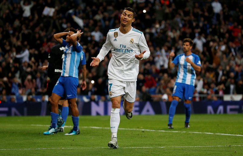 Real Madrid’s Cristiano Ronaldo celebrates scoring their third goal. REUTERS/Javier Barbancho