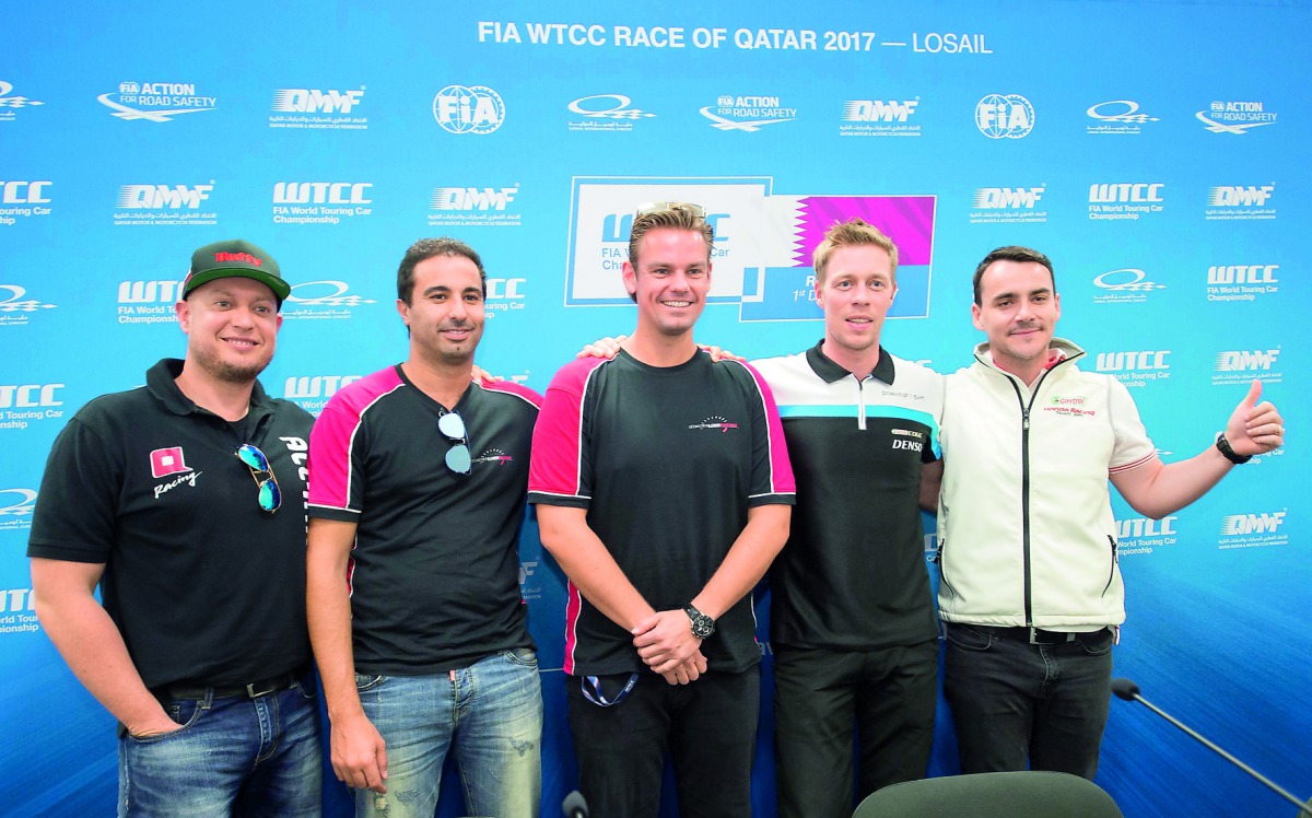 British Driver Robert Huff, Morocco’s Mehdi Bennani, British Driver Tom Chilton, Sweden’s Thed Bjork and Hungarian star Norbert Michelisz pose for a photograph following a press conference held at the Losail International Circuit yesterday.