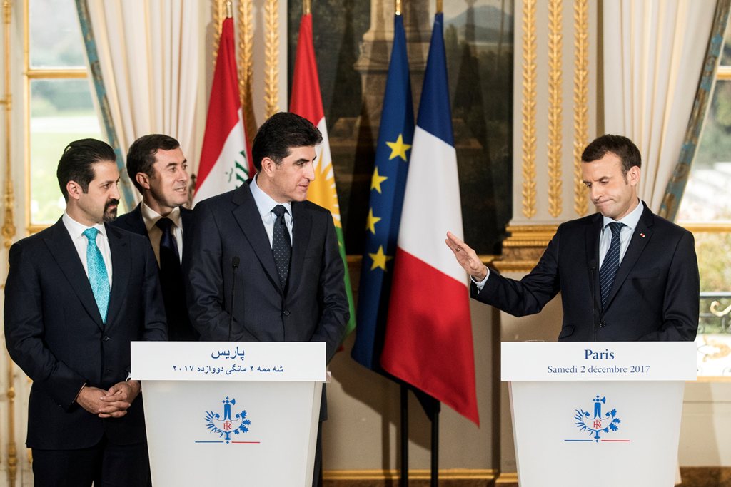 French President Emmanuel Macron (R), Kurdish region's Prime Minister Nechirvan Barzani and Iraqi Kurdistan’s Deputy Prime Minister Qubad Talabani (L) attend a press conference at the Elysee Palace following a meeting in Paris, France, December 2017. (REU