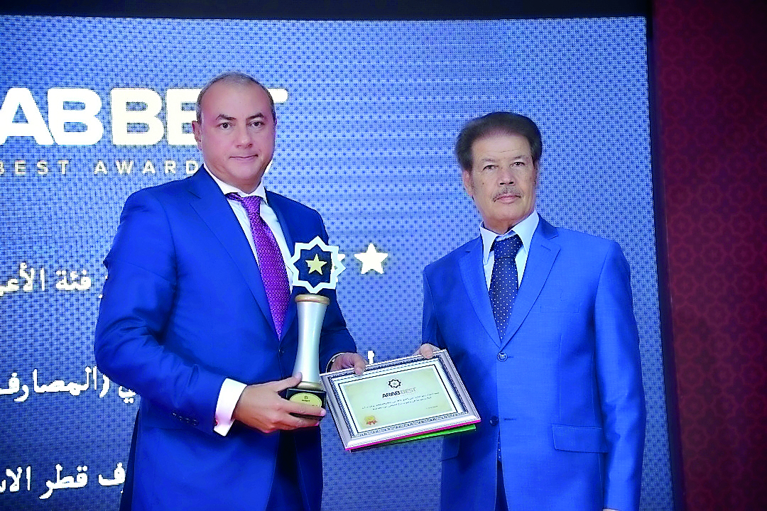 QIB Group CEO, Bassel Gamal (left) receiving the Arab Best Award during a ceremony held in Morocco.