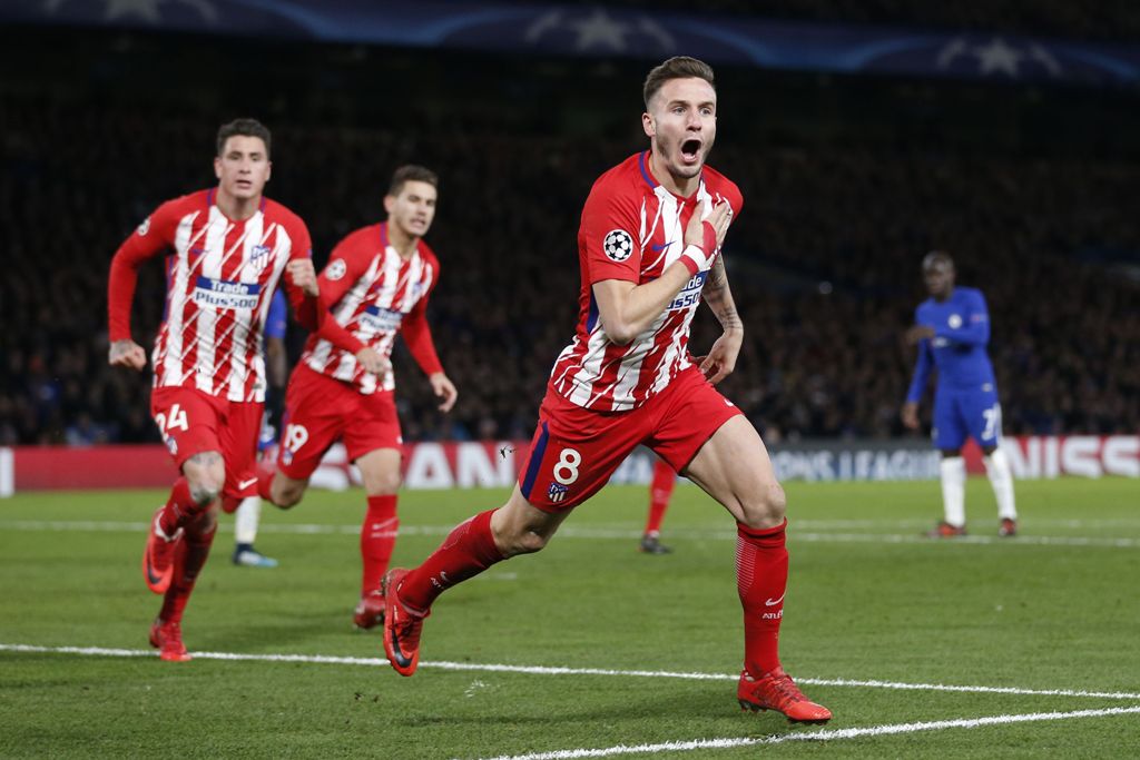 Atletico Madrid's Spanish midfielder Saul Niguez celebrates after scoring during a UEFA Champions League Group C football match between Chelsea and Atletico Madrid at Stamford Bridge in London on December 5, 2017. / AFP / Ian KINGTON
