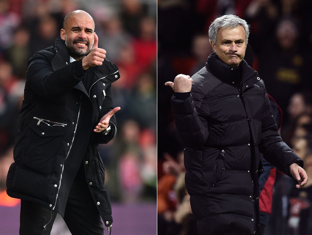 Manchester City's Spanish manager Pep Guardiola (L) and Manchester United's Portuguese manager Jose Mourinho