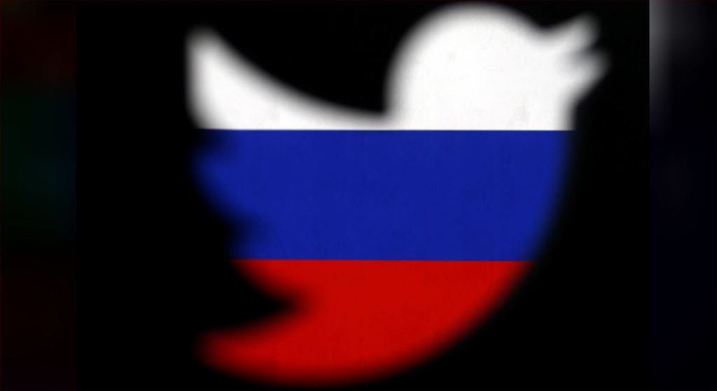 A 3D-printed Twitter logo displayed in front of Russian flag is seen in this illustration picture, October 27, 2017. REUTERS/Dado Ruvic/Illustration