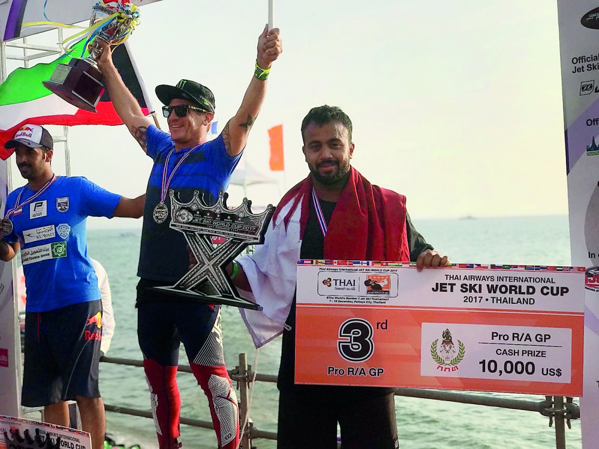 Waleed Mahmoud Al Sharshani (right) of Qatar, who finished third in the Jet Ski Aquabike World Cup 2017, celebrates on the podium in Pattaya, Thailand yesterday.