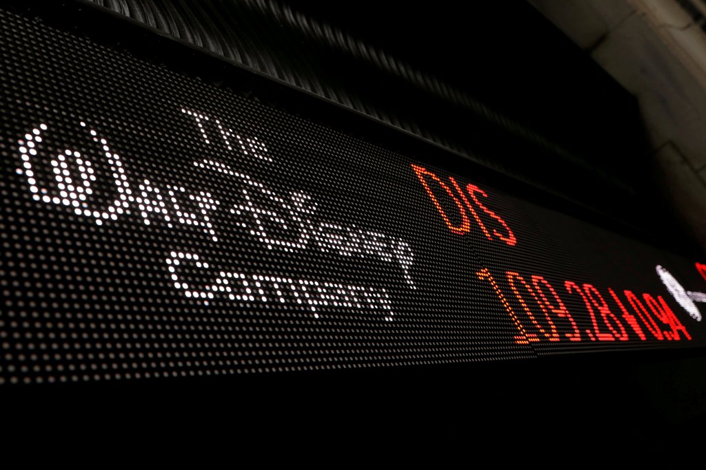 A logo of Walt Disney company is displayed on a monitor outside of the New York Stock Exchange shortly after the opening bell in New York, U.S., December 5, 2017. REUTERS/Lucas Jackson/File Photo
