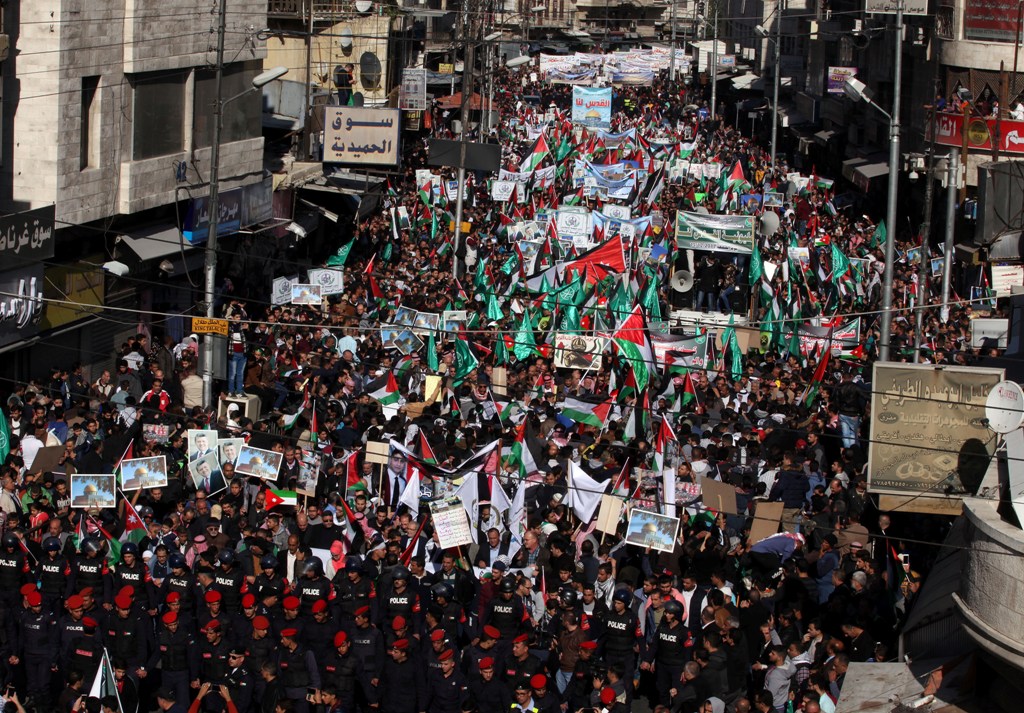 People attend a protest against U.S. President Donald Trump's recognition of Jerusalem as Israel's capital, in Amman, Jordan on December 15, 2017. ( Shadi Nsoor - Anadolu Agency ).
