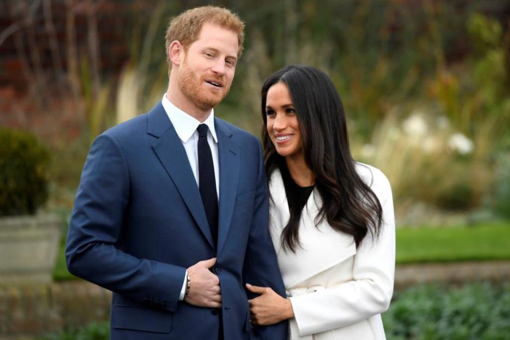 An image of Britain's Prince Harry poses with Meghan Markle in the Sunken Garden of Kensington Palace, London, Britain, November 27, 2017. REUTERS/Toby Melville