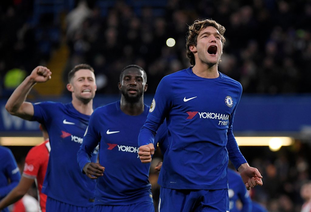 Chelsea's Marcos Alonso celebrates scoring their first goal. REUTERS/Toby Melville