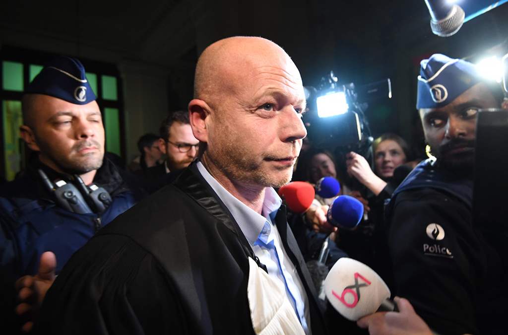 Belgian lawyer Sven Mary leaves Brussels' courthouse after a hearing regarding the postponement of the trial of his client, Paris attacks suspect Salah Abdeslam, on December 18, 2017. AFP / EMMANUEL DUNAND