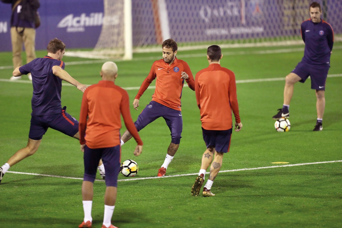 Paris Saint-Germain’s Brazilian forward Neymar (centre) trains with team-mates during their Winter Training Camp at the Aspire training pitch in Doha yesterday. Pic Baher Amin