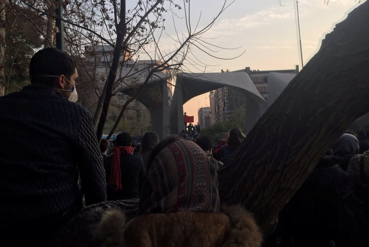 People protest near the university of Tehran, Iran December 30, 2017 in this picture obtained from social media. 
