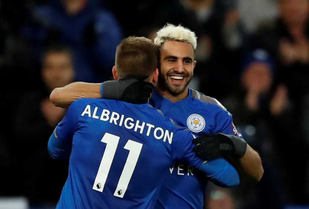 Leicester City's Riyad Mahrez celebrates scoring their first goal with Marc Albrighton Action Images via Reuters/Andrew Boyers 