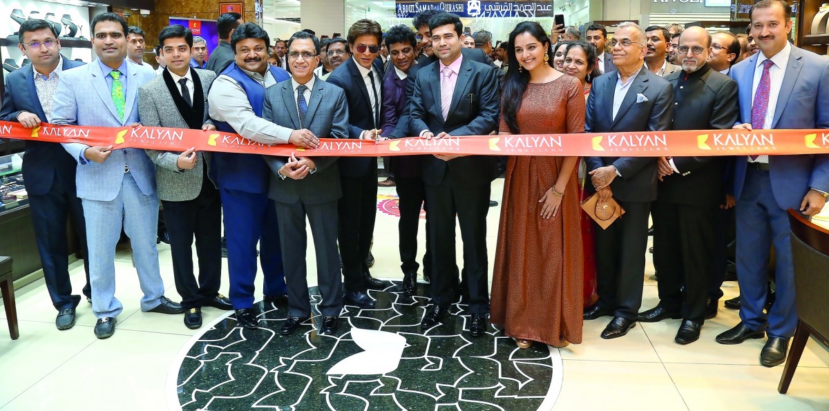 Indian actors led by Shah Rukh Khan (sixth left) inaugurate a Kalyan Jewellers showroom in Oman.
