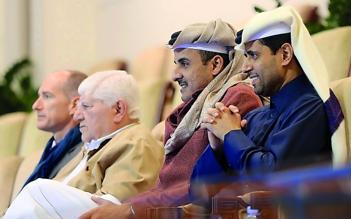 Emir H H Sheikh Tamim bin Hamad Al Thani watching the action of Qatar ExxonMobil Open Men’s singles second round at the Khalifa International Tennis and Squash Complex, yesterday.