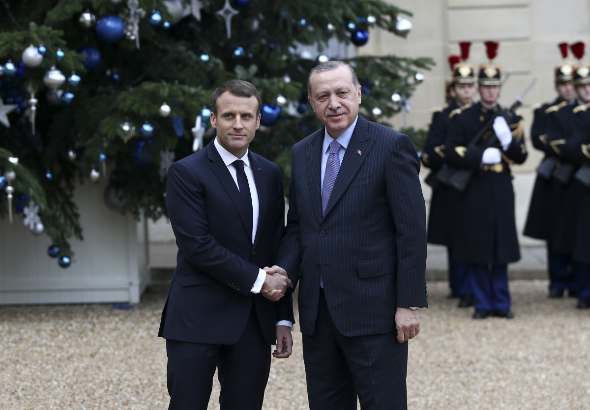 President of Turkey, Recep Tayyip Erdogan (R) is welcomed by President of France, Emmanuel Macron (L) during an official ceremony at Elysee Palace on January 05, 2018. (Murat Kula/ Anadolu Agency)