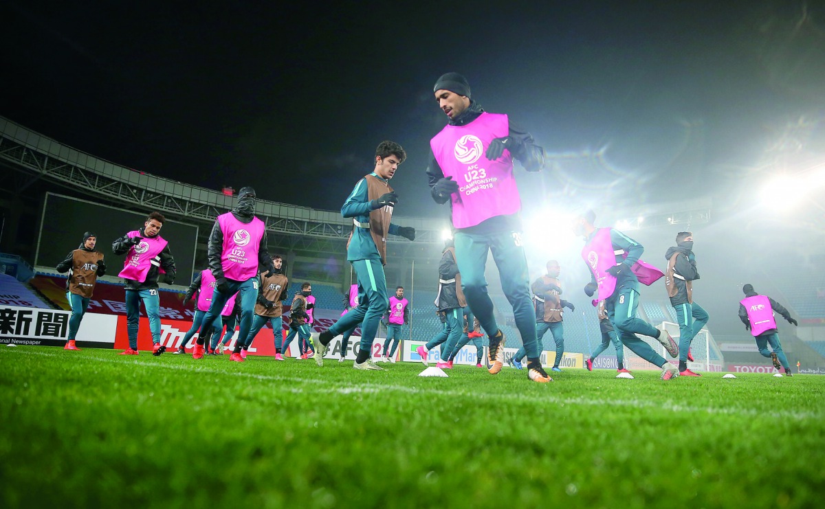 Qatar under-23 players in action during a training session in Changzhou, china yesterday.