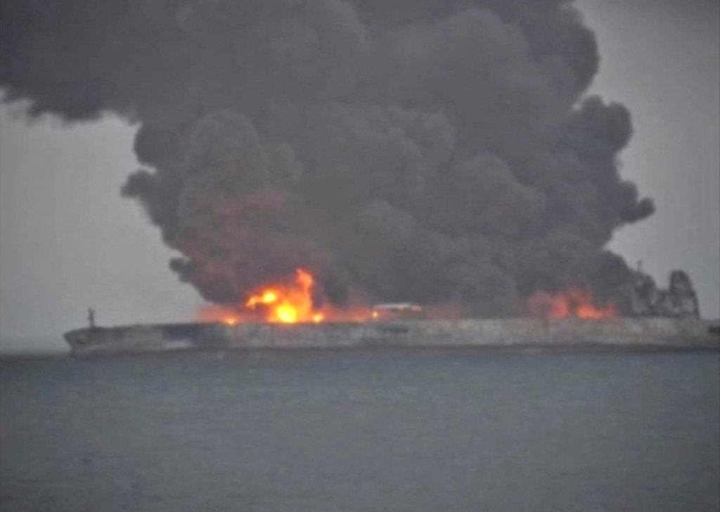 Smoke and fire is seen from Panama-registered tanker SANCHI carrying Iranian oil after it collided with a Chinese freight ship in the East China Sea, in this still image taken from a January 7, 2018 video. China Central Television (CCTV) via REUTERS TV