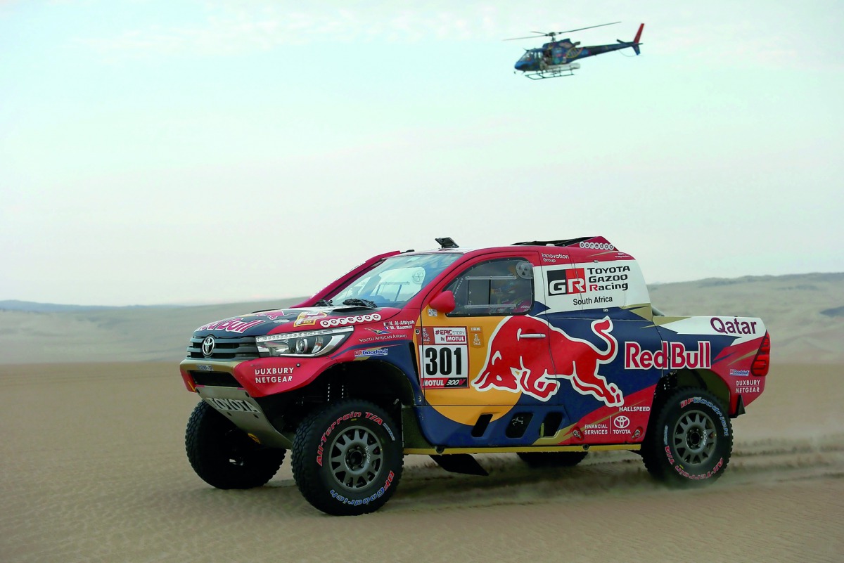 Nasser Al Attiyah of Qatar and co-pilot Matthieu Baumel from France drive their Toyota during the 2018 Dakar Rally Stage 2 in and around the Peruvian town of Pisco, yesterday.